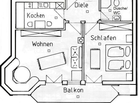 Grundrissplan Grundriss einer Wohnung mit Wohn-, Schlafzimmer, Küche und Balkon.
